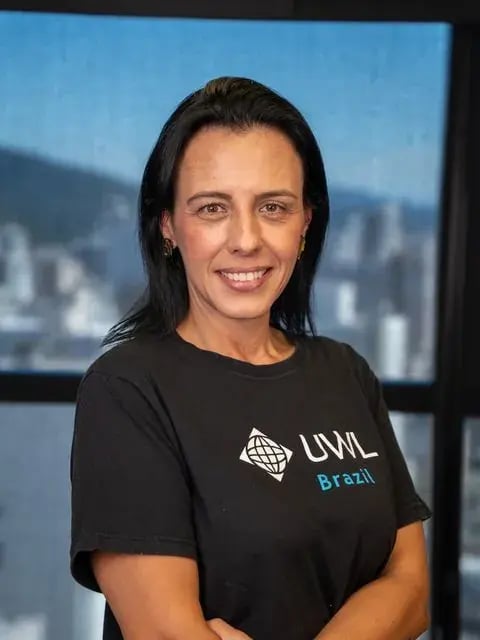 UWL do Brasil employee with the port view behind